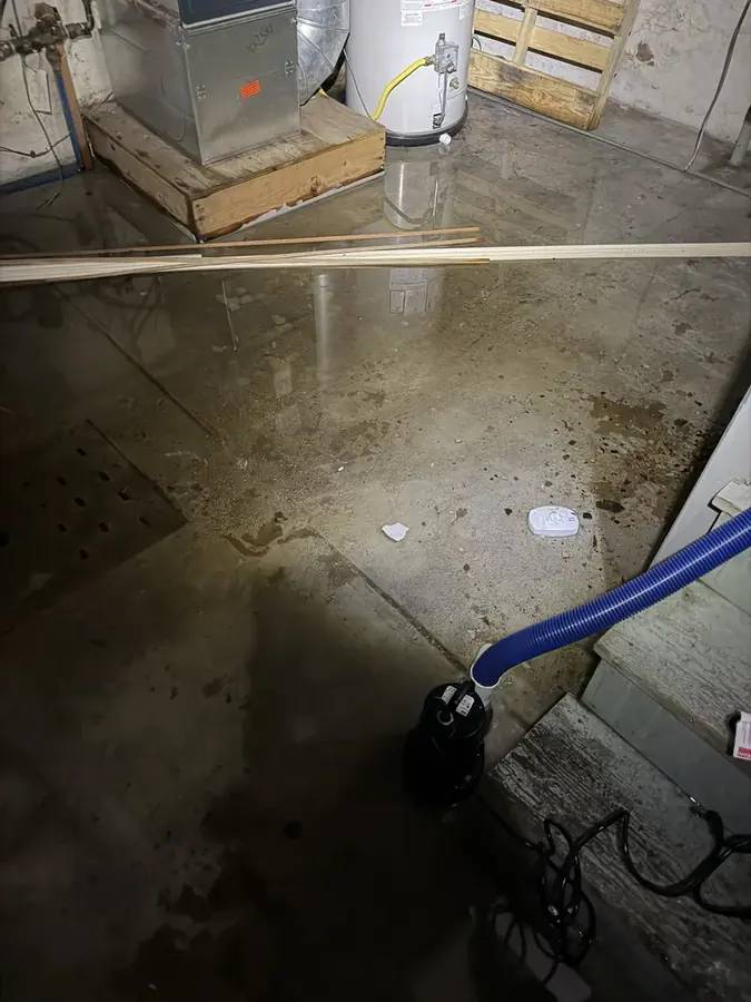 A high-volume air mover running on a floor in a Peyton, CO home